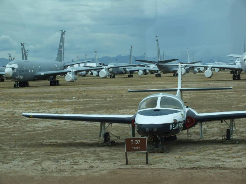 A T-37 Tweet on "Celebrity Row" with a bunch of Boeing C-135s in the background.